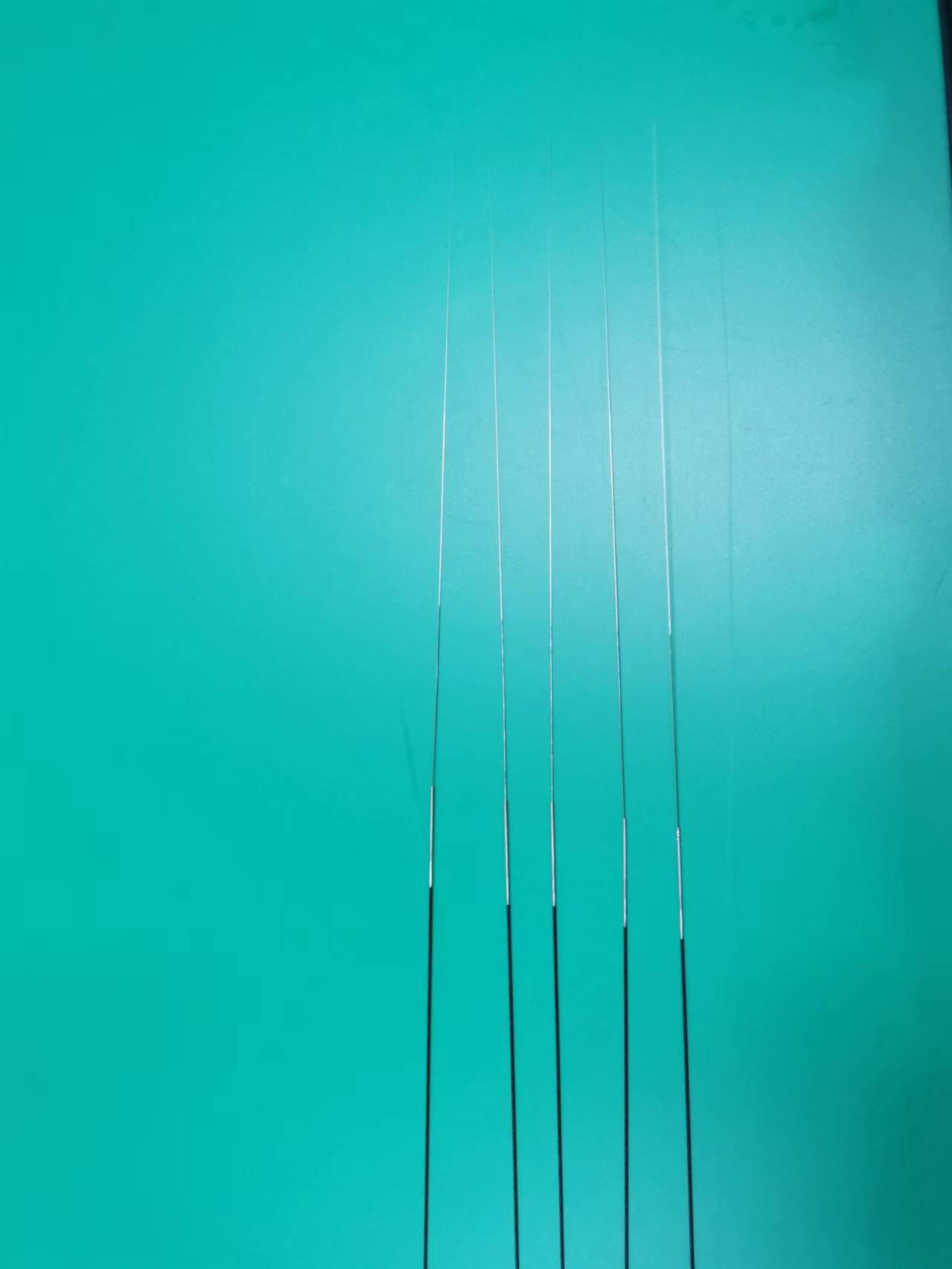 Hypotube with PTFE Coating and Weld Wire Distal